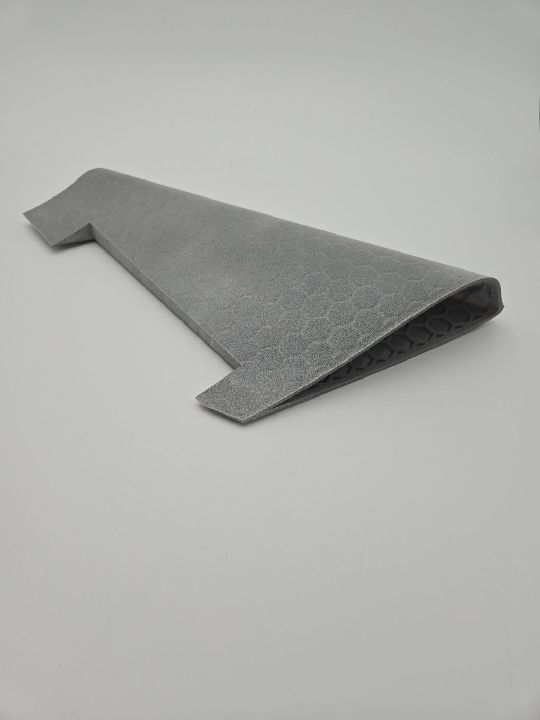 A large lattice-infilled airframe panel printed for a fixed-wing drone